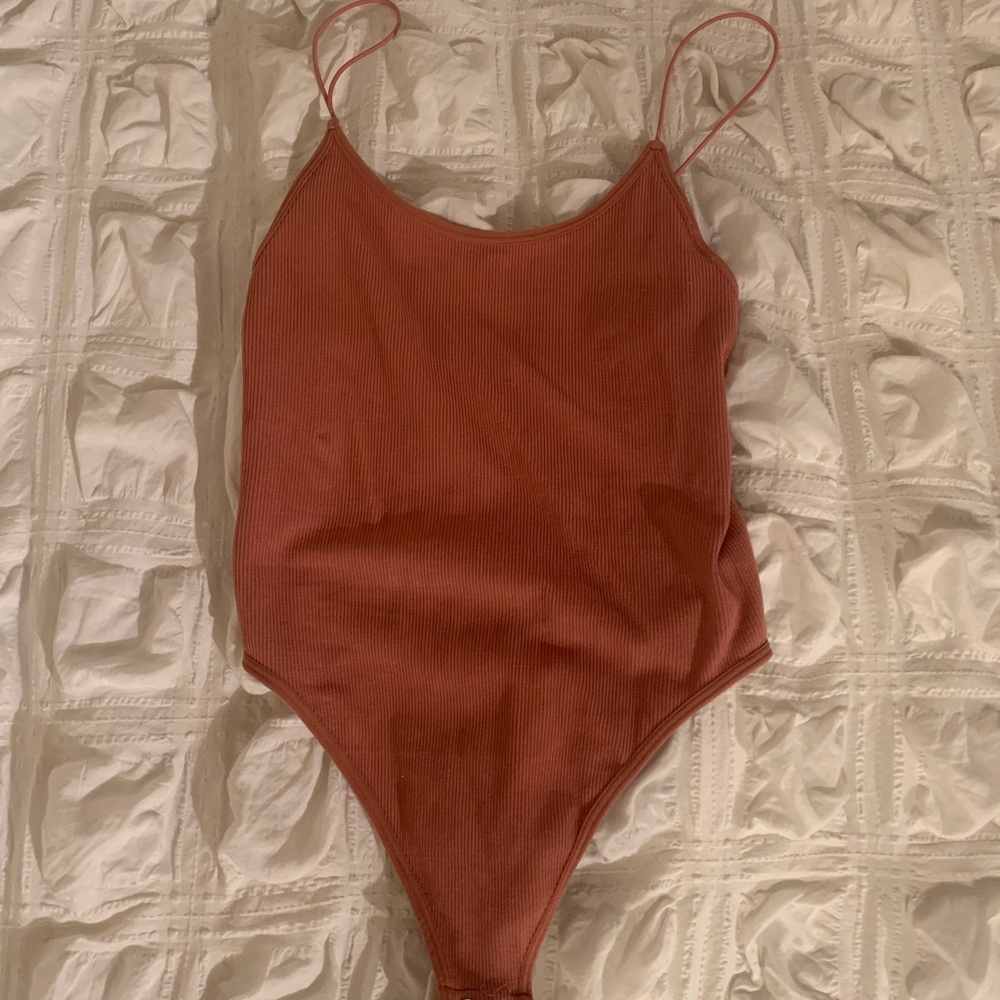 Peach body suit